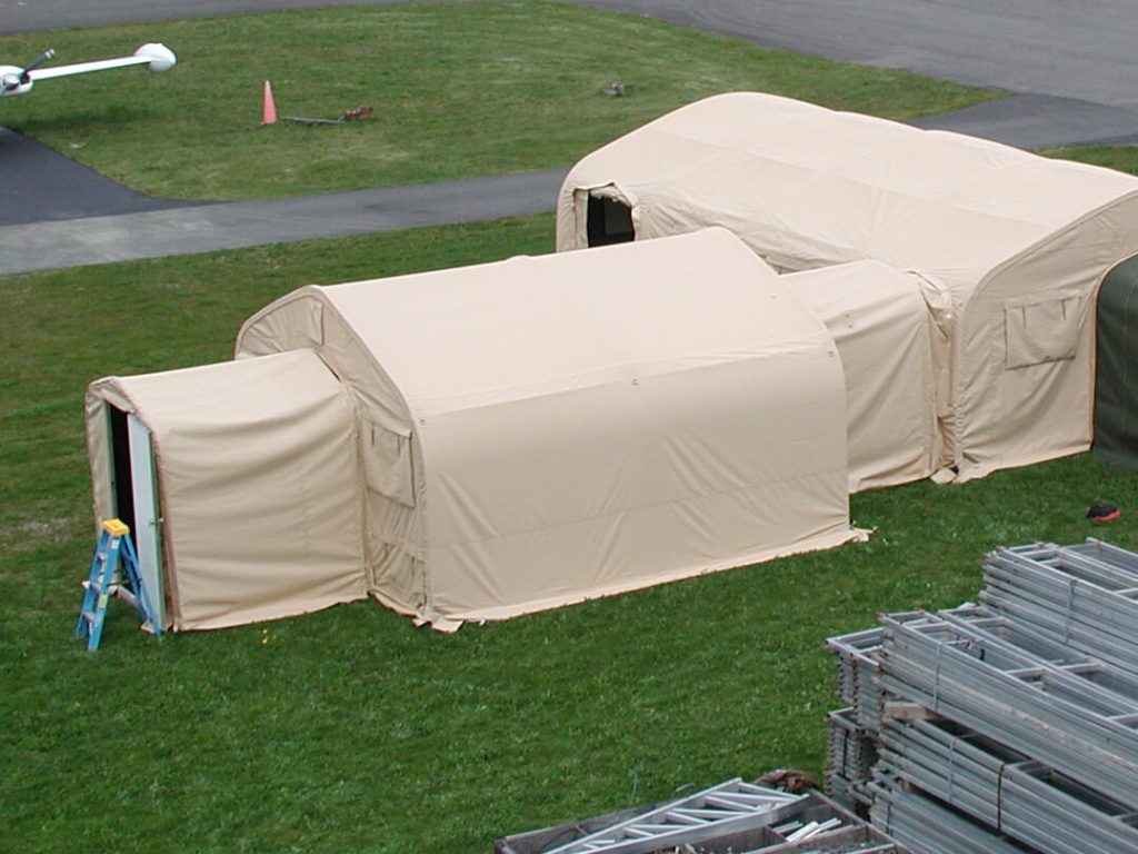 CAMSS: Two Tan CAMSS 16EX Military Shelters Complexed
