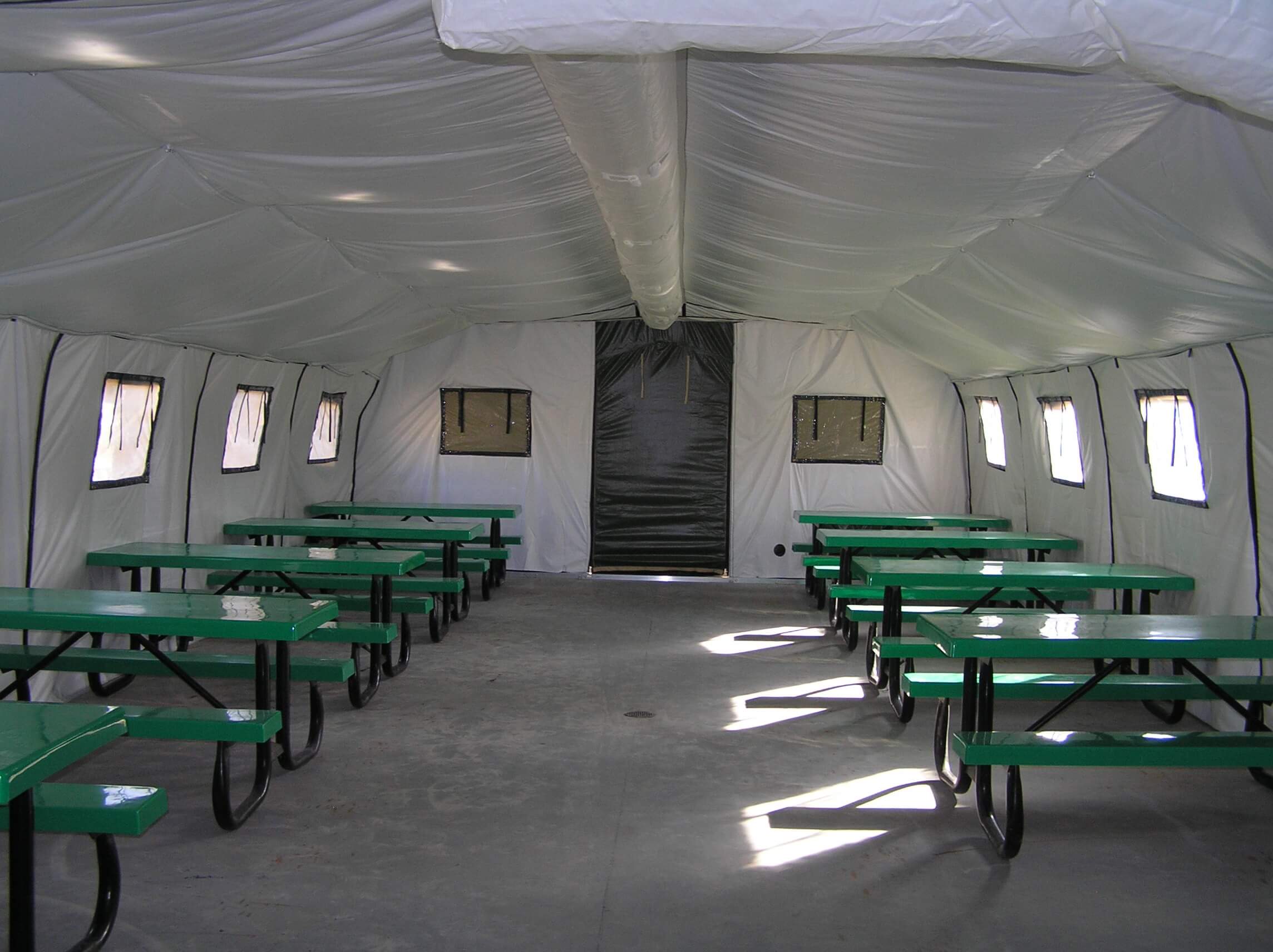 CAMSS: Green Tables Inside CAMSS Military Shelter Interior
